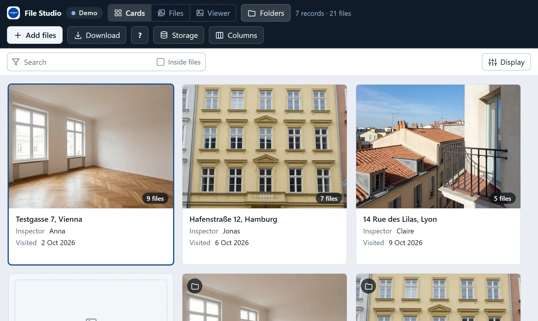 File Studio Cards layout: property inspections in Vienna, Hamburg and Lyon, each card with a cover photo, the number of files, the inspector and the visit date